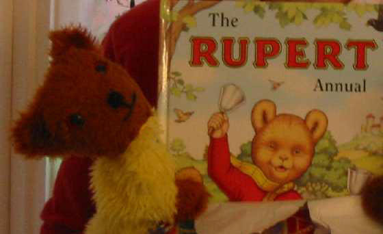 Yellow and Brown Teddy with Rupert Bear book