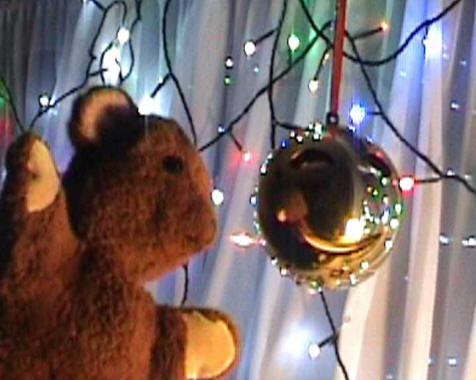 Brown Teddy with the Singing Christmas Ball