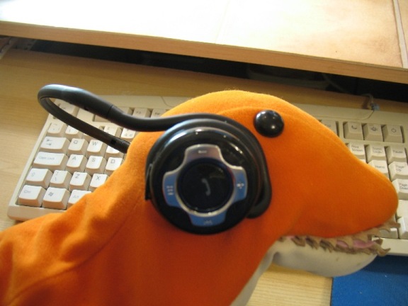 Dino with Bluetooth headset