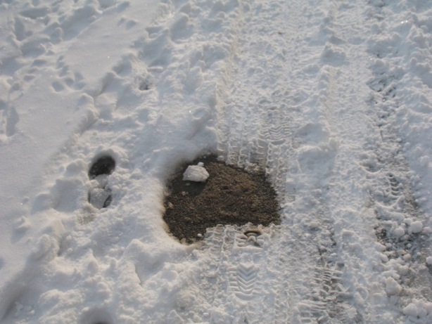 Gravel melting snow 1