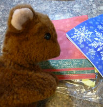 Brown Teddy arranging the napkins