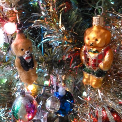 Two types of teddy decorations on Christmas tree