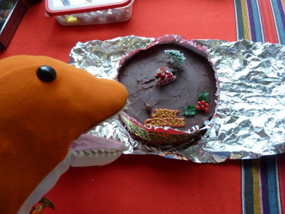 Dino and chocolate Christmas cake