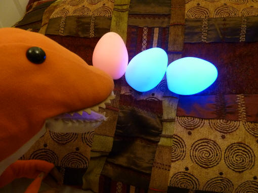 Dino with glowing egg lights