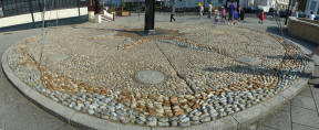 Herne Bay - Pebbles art around a flagpost