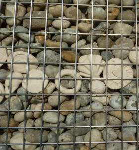 Whitstable - Gabion baskets with fake fossils