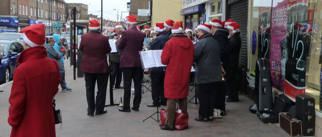 Brass band playing Christmas songs in Orpington High Street