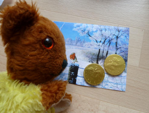 Yellow Teddy with chocolate money