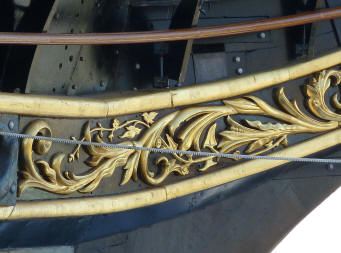 Greenwich - Cutty Sark gold decoration on prow