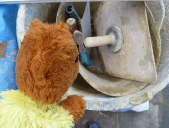 Yellow Teddy with builder's bucket of tools