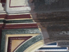 Arch showing painted and rusty sections