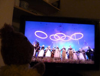 Yellow Teddy watching Olympics Opening Ceremony