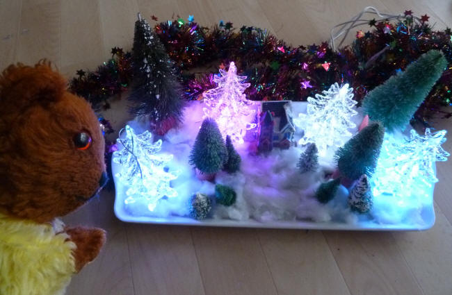 Yellow Teddy with tray of LED trees