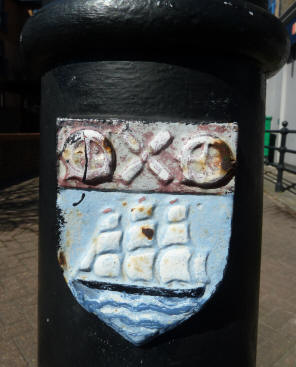 Part of coat of arms on bollard