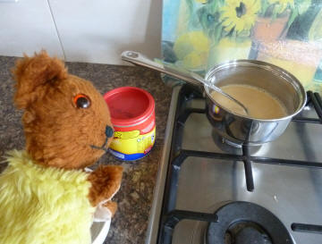 Yellow Teddy making custard