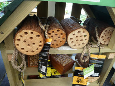 Drilled log insect houses
