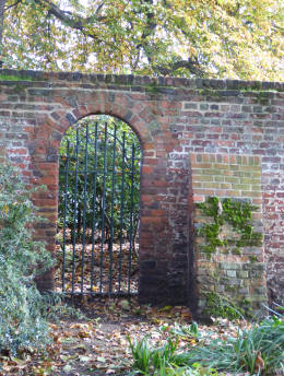 Old brick wall and gateway