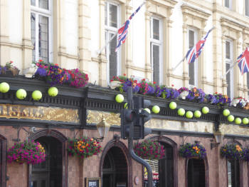 Tennis balls display on pub frontage