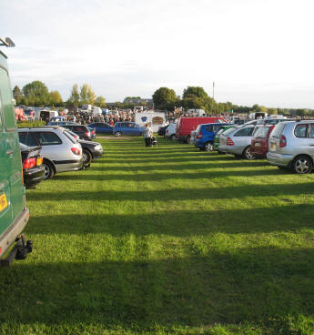 Tripes Farm boot fair with stripy shadows