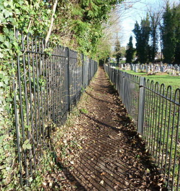 Footpath between Priory Park and church grounds