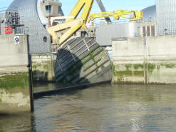 Barrier emerging from water