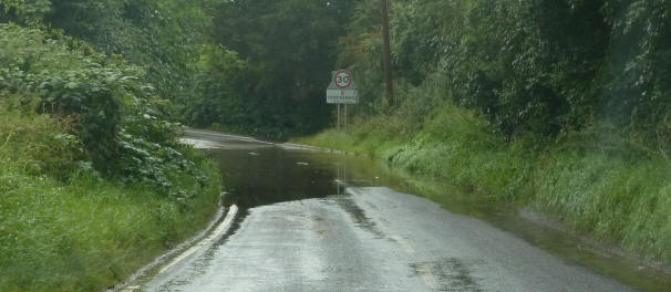 Puddle across road