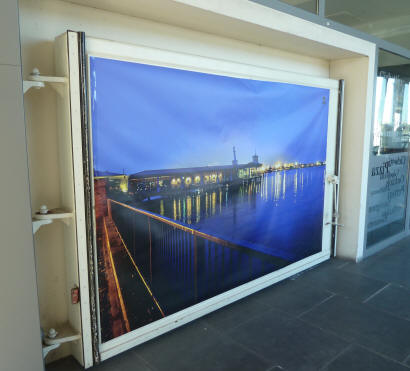 Town Pier gate with large print