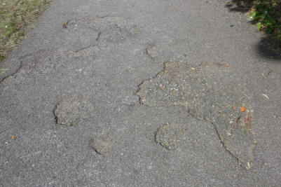 Asphalt with map of Africa shape