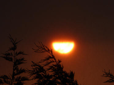 Sun and storm clouds