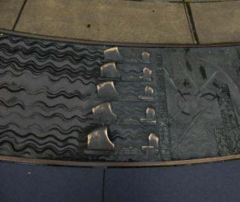 Edge of sundial showing Thames Barrier