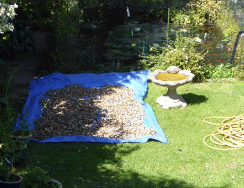 Pebbles on tarpaulin